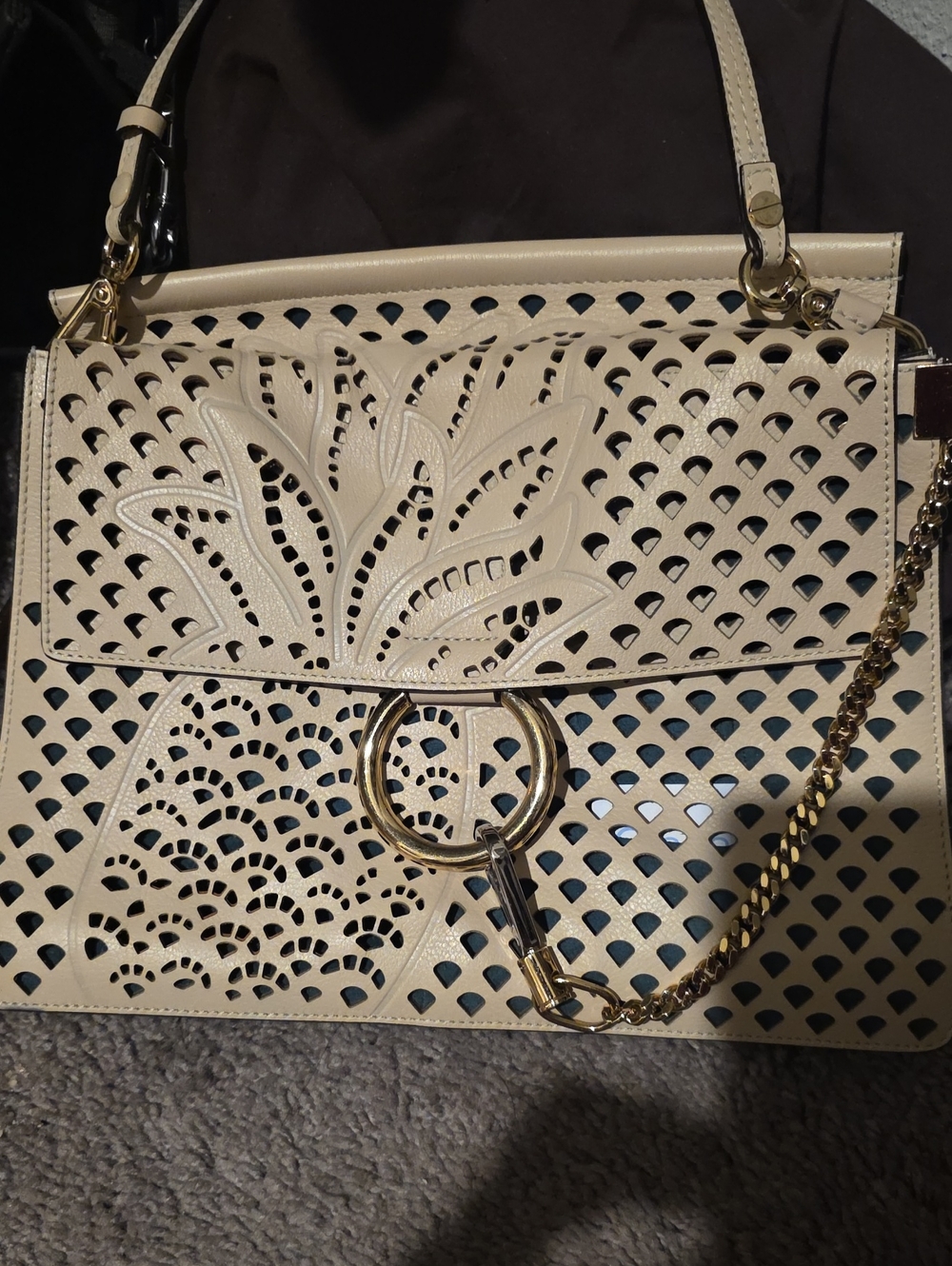 Chloe Faye Shoulder BagCream Laser-Cut Crossbody Bag with Gold Ring Accent